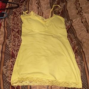 A spegetti strap in color of yellow neon/lace.....
